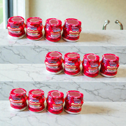 Red chandan paste container used for tilak, puja, and religious ceremonies