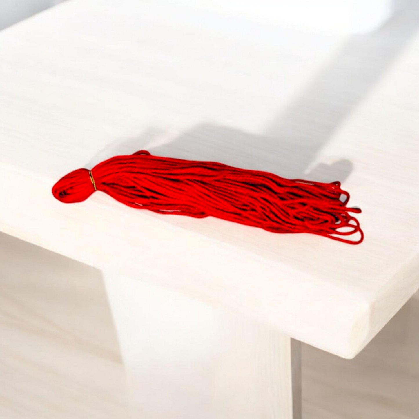 Red cotton Lal Dhaga thread rolls (25 meters each) – Pack of 2, used for spiritual protection rituals