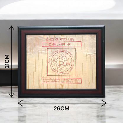 Sacred Vastu Dosh Nivaran Yantra inscribed on Bhojpatra and set in an antique wooden frame with glass cover, ideal for home or office.