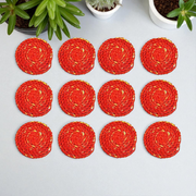 Set of 12 hand-rolled cotton Kalava wicks (Mauli Batti) in red-yellow color, arranged neatly for pooja use