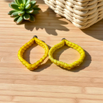 Set of 2 Handmade Yellow Raksha Sutra Bracelets with adjustable cotton thread, designed for spiritual protection and daily wear