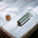Set of 5 bullet-shaped taweez made of silver and copper with screw caps and free Bhojpatra sheets, designed for spiritual energy and protection