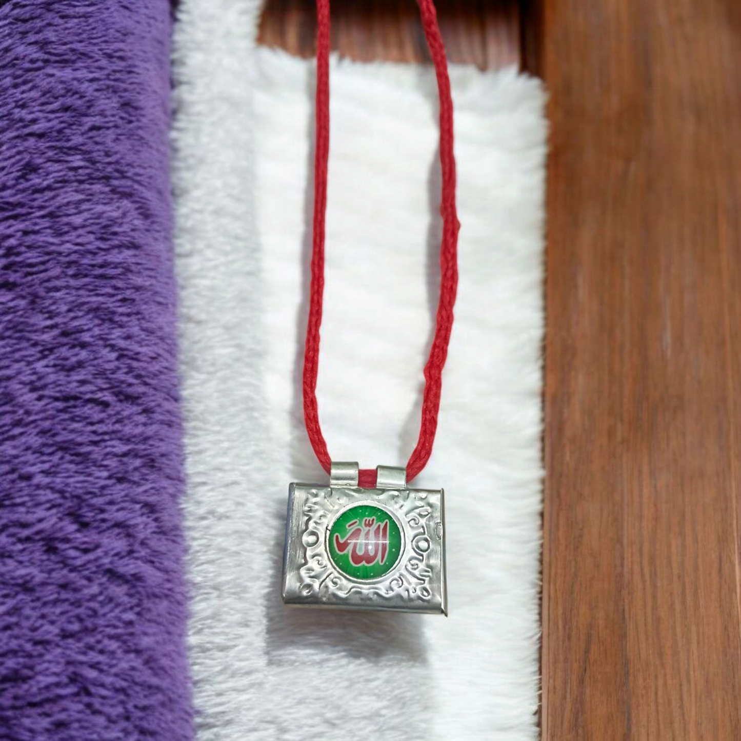 Set of 5 handcrafted silver square taweez with intricate Islamic design and free Bhojpatra sheet placed beside them