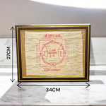 Shri Hanuman Yantra inscribed on Bhojpatra, framed in an antique wooden frame with glass cover, placed on a wooden altar.