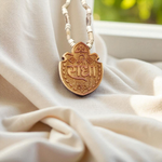 Shri Radha Locket strung in a handcrafted Tulsi Mala with secure screw lock, photographed on a neutral background