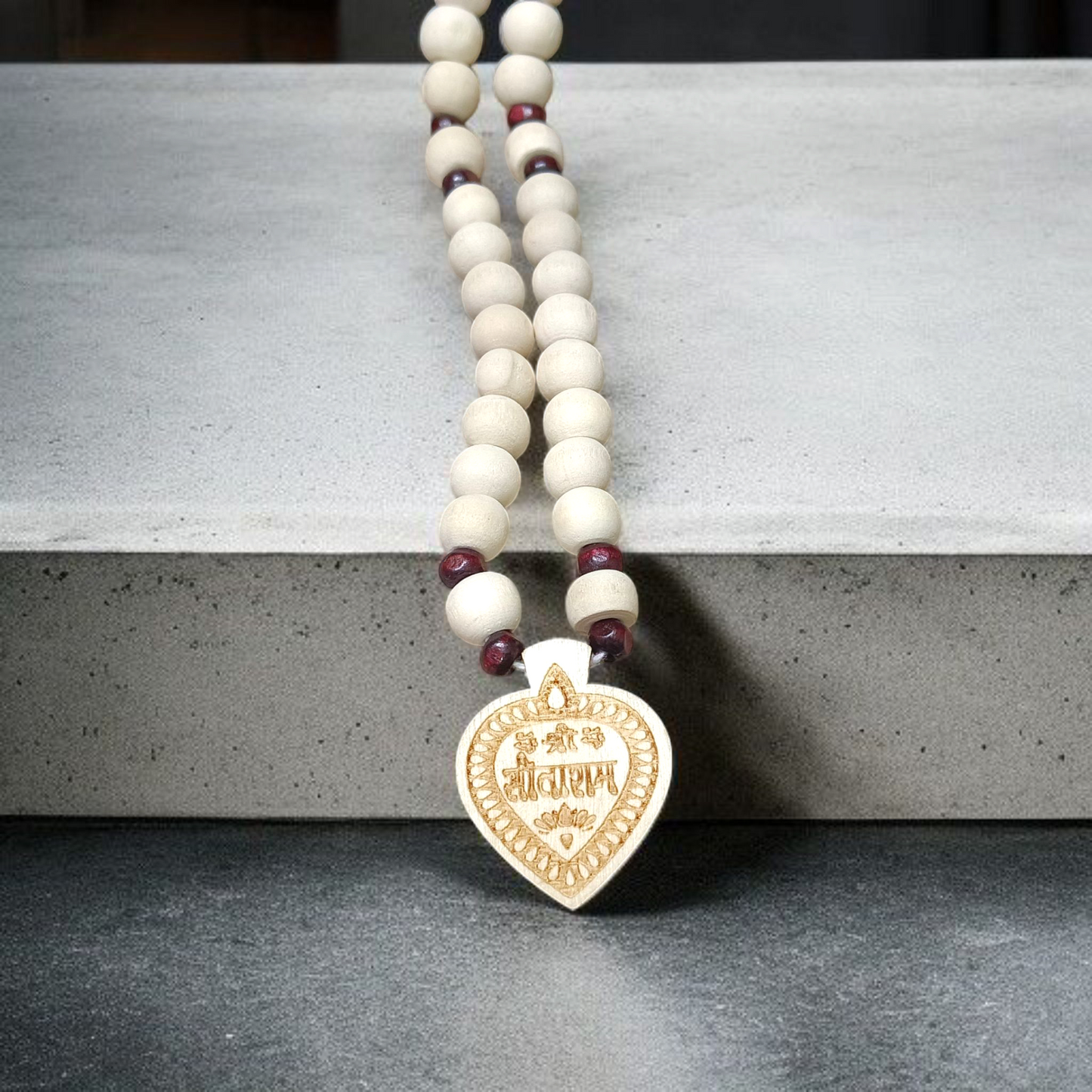 Shri Sita Ram Tulsi Mala with ornate locket and stylish screw lock, displayed elegantly on a neutral surface