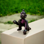 Small Black Laddu Gopal idol in sitting posture with intricate detailing, ideal for home temple and pooja