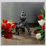 Small Black Laddu Gopal idol in sitting posture with intricate detailing, ideal for home temple and pooja