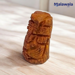 Small Haldi Ganesh Ji idol handcrafted from turmeric – perfect for home temple, office desk, and car dashboard – vibrant and auspicious