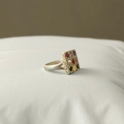 Square-shaped Navratan Ring by MALAWALA with 9 colorful gemstones set in Panchdhatu, suitable for astrology enthusiasts and spiritual use