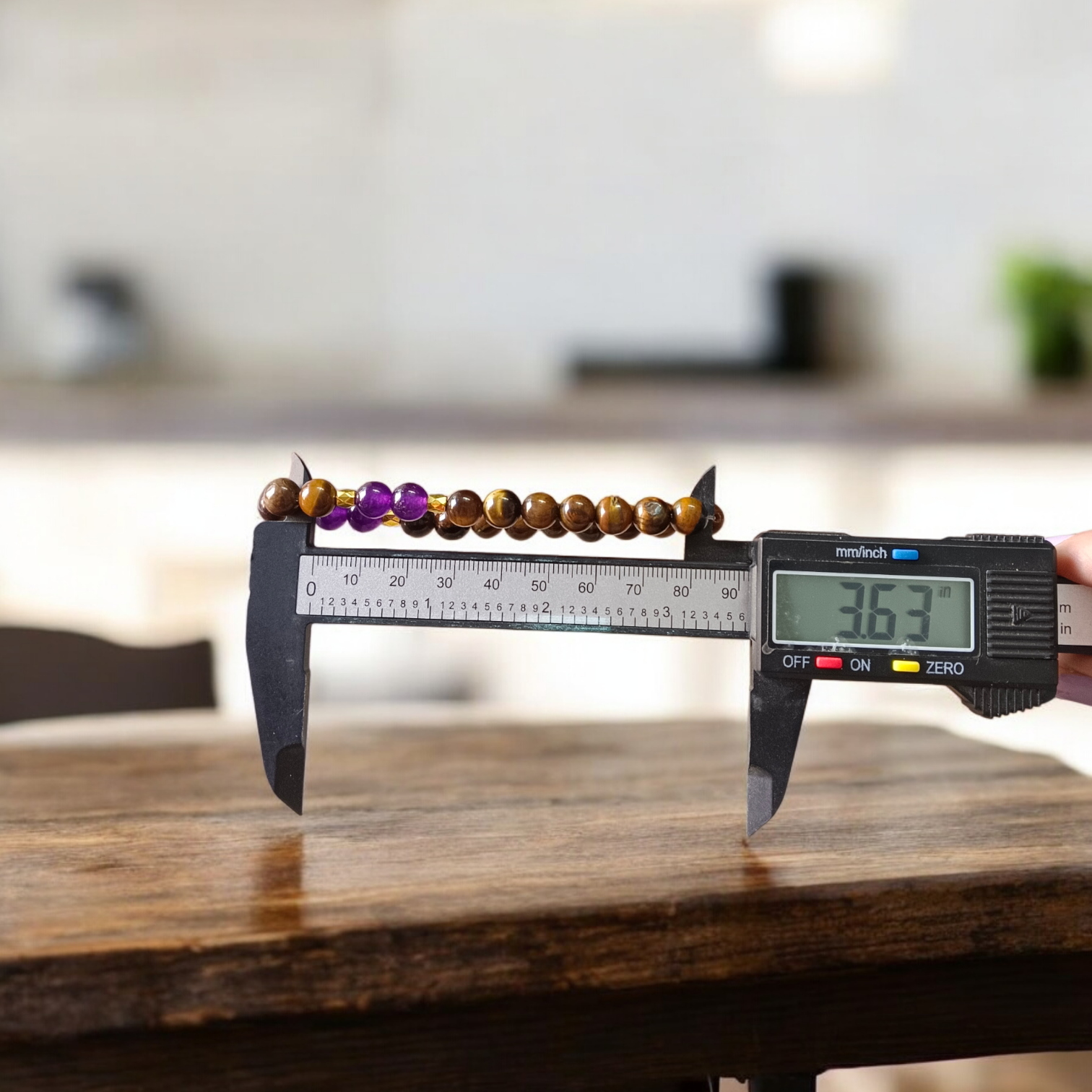 Stretchable bracelet made with lab certified 8mm Tiger Eye and Amethyst gemstone beads, ideal for meditation and daily wear
