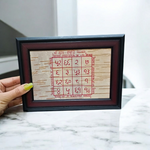 Sukh Samridhi Yantra hand-inscribed on Bhojpatra and enclosed in a wooden frame for prosperity and happiness