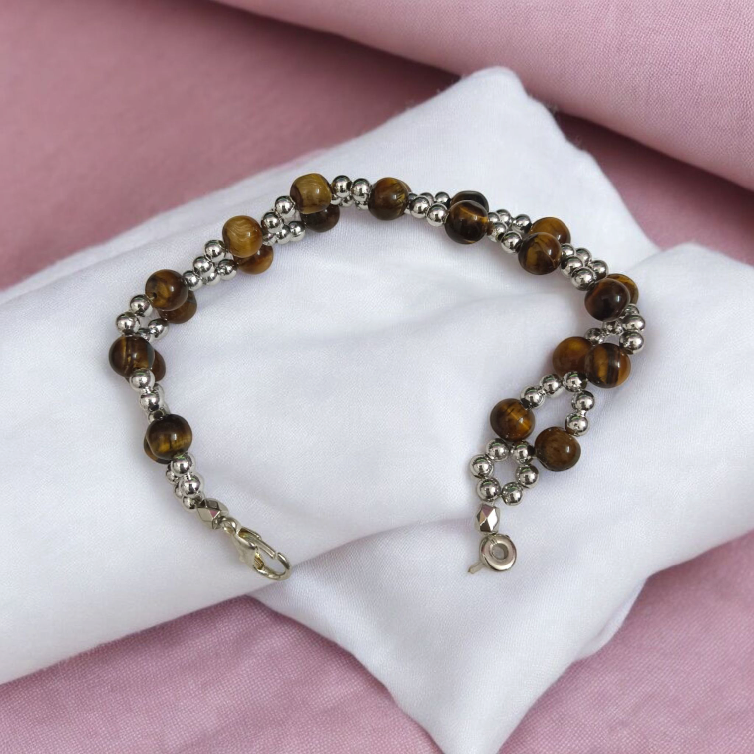 Natural Blue Chalcedony Bracelet made with 8mm smooth round stretchable beads, lab certified, placed on a natural stone background
