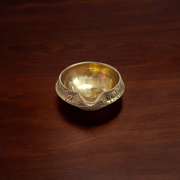 Traditional brass oil lamp for pooja and aarti, handcrafted with a deep reservoir and wide base, ideal for temples and home rituals