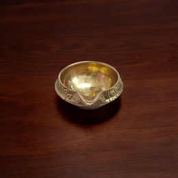 Traditional brass oil lamp for pooja and aarti, handcrafted with a deep reservoir and wide base, ideal for temples and home rituals
