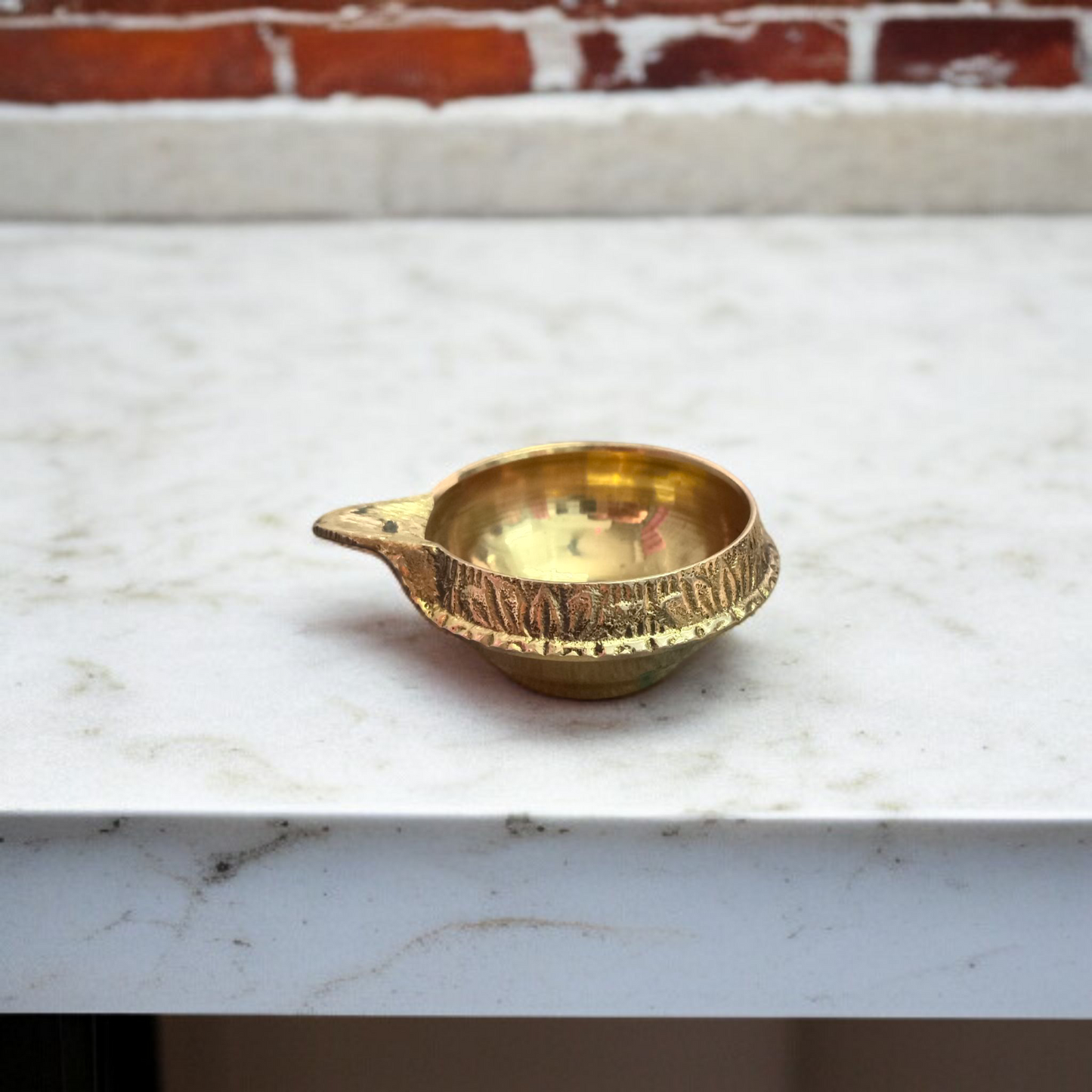 Traditional brass oil lamp for pooja and aarti, handcrafted with a deep reservoir and wide base, ideal for temples and home rituals