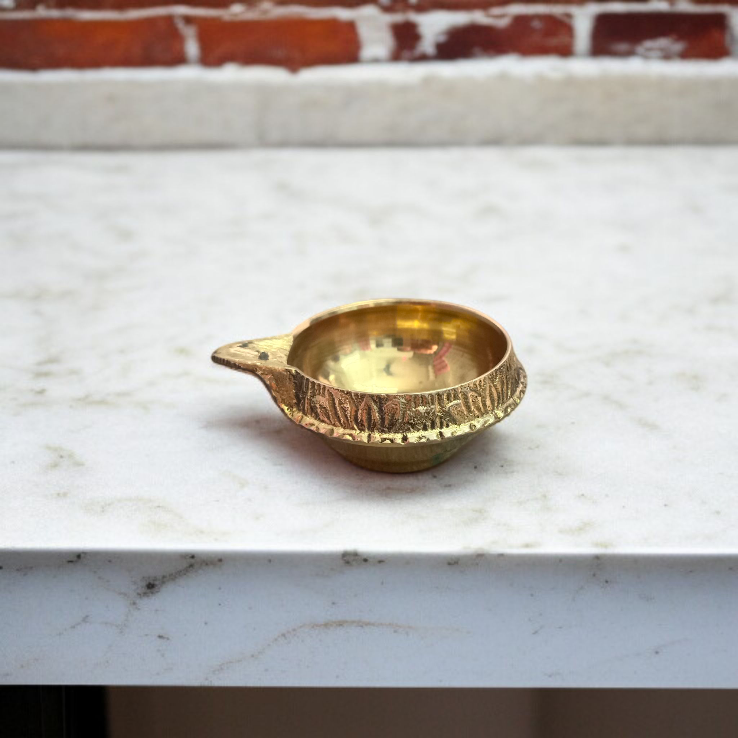 Traditional brass oil lamp for pooja and aarti, handcrafted with a deep reservoir and wide base, ideal for temples and home rituals