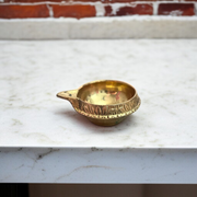 Traditional brass oil lamp for pooja and aarti, handcrafted with a deep reservoir and wide base, ideal for temples and home rituals