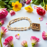 Tulsi Mala featuring Shri Bageshwar Dham Locket engraved with Jai Sita Ram and secure screw lock, placed neatly for display