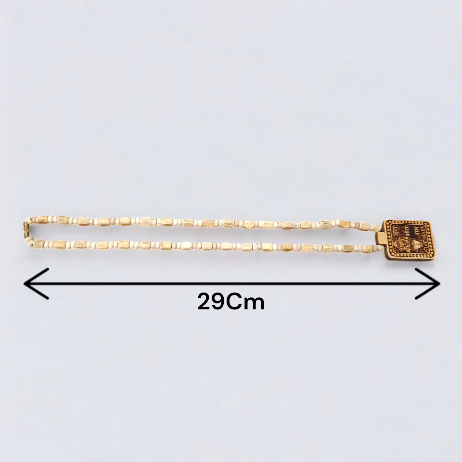 Tulsi Mala featuring Shri Bageshwar Dham Locket engraved with Jai Sita Ram and secure screw lock, placed neatly for display