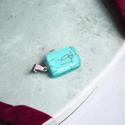 Tumbled turquoise blue howlite pendant with chain – calming and certified healing stone necklace
