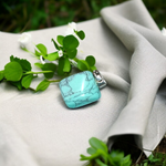 Tumbled turquoise blue howlite pendant with chain – calming and certified healing stone necklace