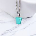 Tumbled turquoise blue howlite pendant with chain – calming and certified healing stone necklace