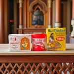 White, Yellow, and Red Chandan Tilak paste in eco-friendly containers for forehead application during pujas and meditation