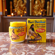 White, Yellow, and Red Chandan Tilak paste in eco-friendly containers for forehead application during pujas and meditation
