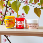 White, Yellow, and Red Chandan Tilak paste in eco-friendly containers for forehead application during pujas and meditation