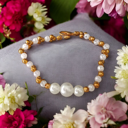 White and golden pearl bracelet with alternating beads, beautifully handcrafted for girls and women, perfect for festive and daily wear