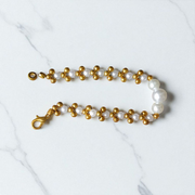 White and golden pearl bracelet with alternating beads, beautifully handcrafted for girls and women, perfect for festive and daily wear