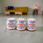 White chandan paste container used for tilak, puja, and religious ceremonies