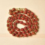 Wired Rudraksha Mala featuring 5mm Rudraksha beads wrapped in golden wire, neatly handcrafted and ideal for meditation or daily wear
