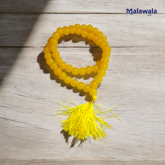 Yellow Agate Mala with 54+1 hand-knotted 8 mm beads, featuring vibrant yellow tones and a traditional guru bead, ideal for meditation and healing