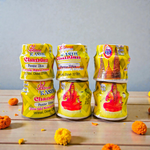Yellow chandan paste container used for tilak, puja, and religious rituals