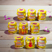 Yellow chandan paste container used for tilak, puja, and religious rituals