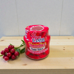 Yellow, red, and white chandan paste containers used for tilak, puja, and religious rituals