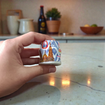 Yellow, red, and white chandan paste containers used for tilak, puja, and religious rituals